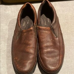 Men's Brown Leather Rockport slip on shoes.